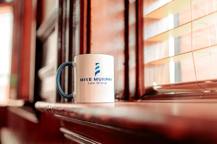 A firm mug on a windowsill in the Moncton office