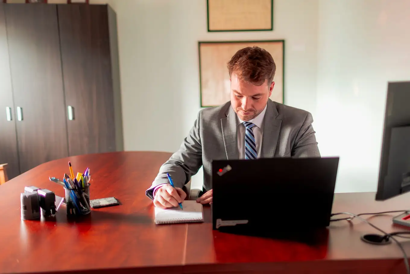 Drafting at a desk in the firm's Moncton office