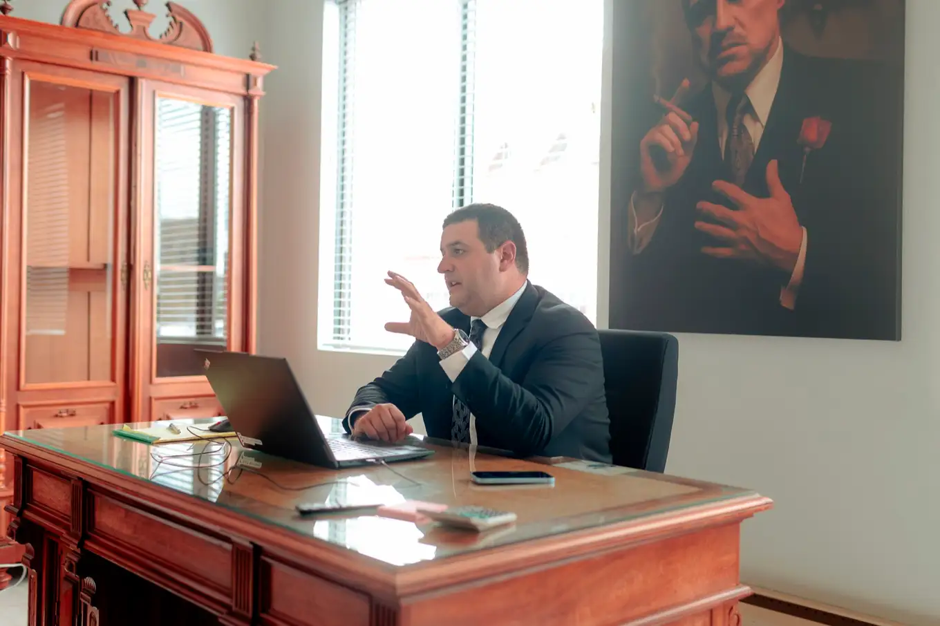 Taylor Morin at his desk in the firm's Moncton office